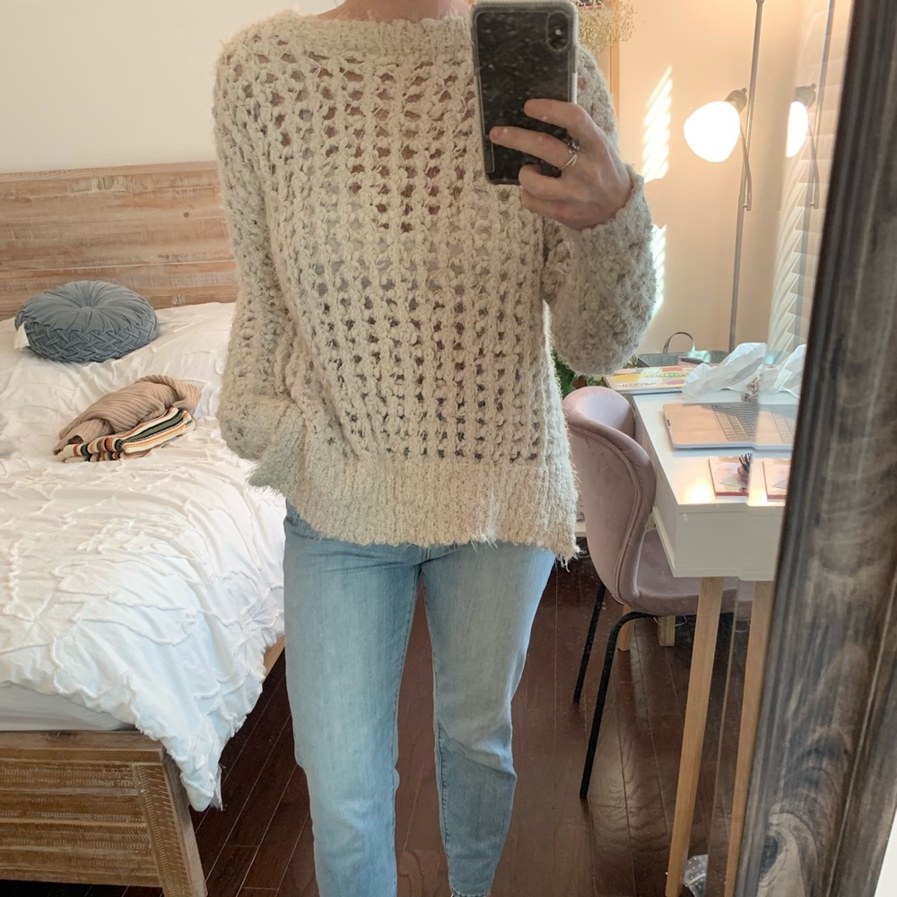 Cream, knitted, cozy sweater.